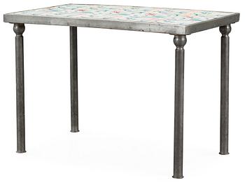 402. A tiled top Tyra Lundgren pewter based table,