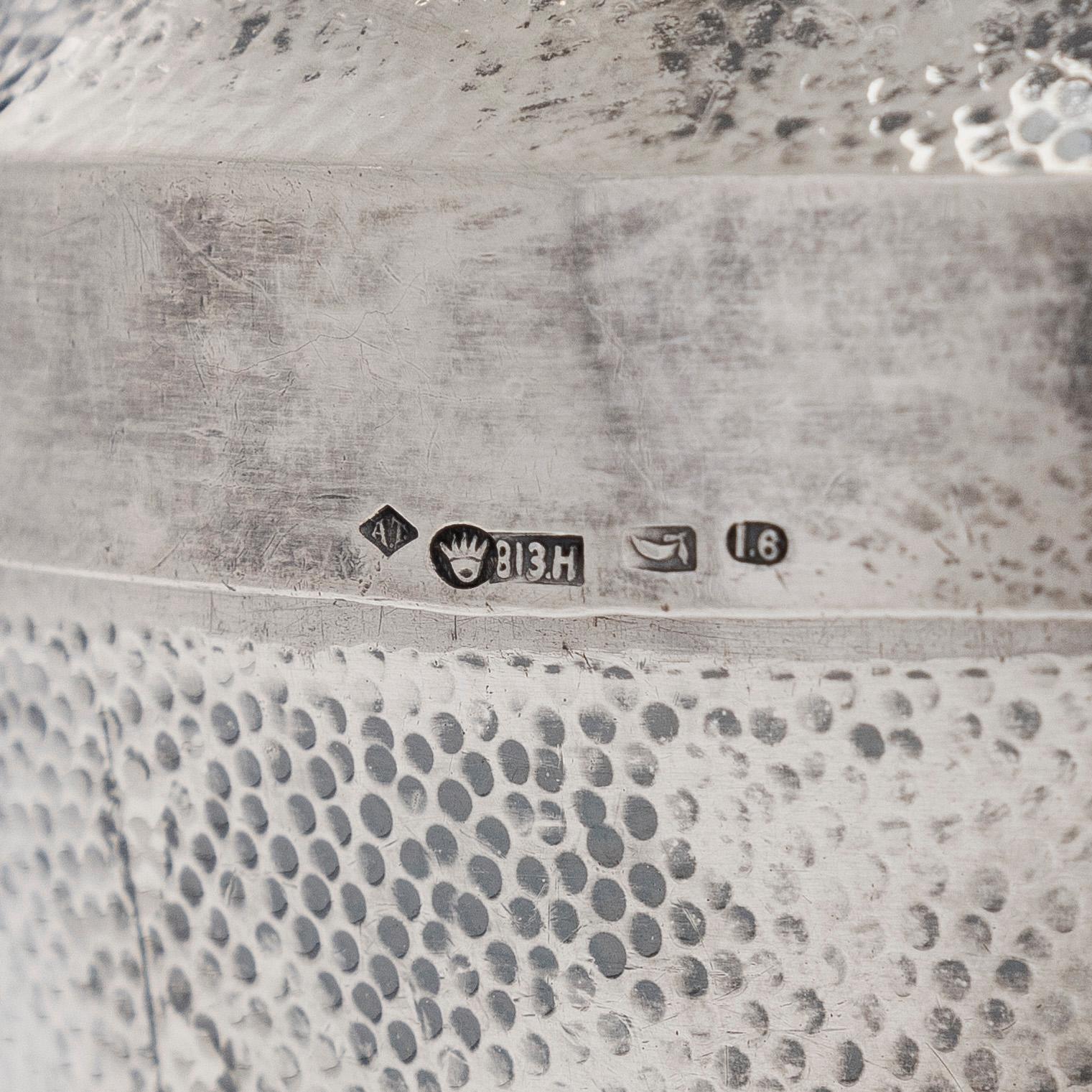 A silver cocktail shaker with strainer, Japan, first half of the 20th century.