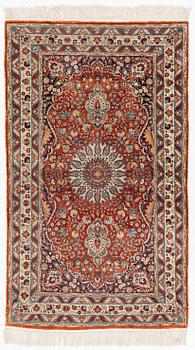 An Oriental silk rug, c 159 x 95 cm.