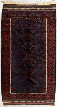 A rug, semi-antique, Beludj, ca 238 x 132 cm.