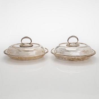 A set of four silver plated entree dishes, England.