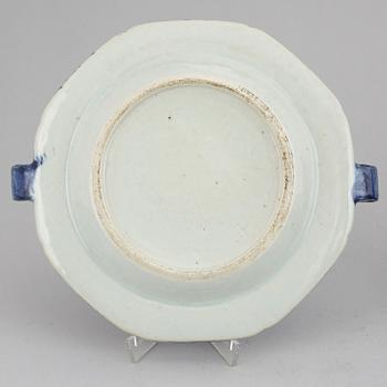 A set of three blue and white plates and a hot water dish, Qing dynasty, 18th/19th Century.