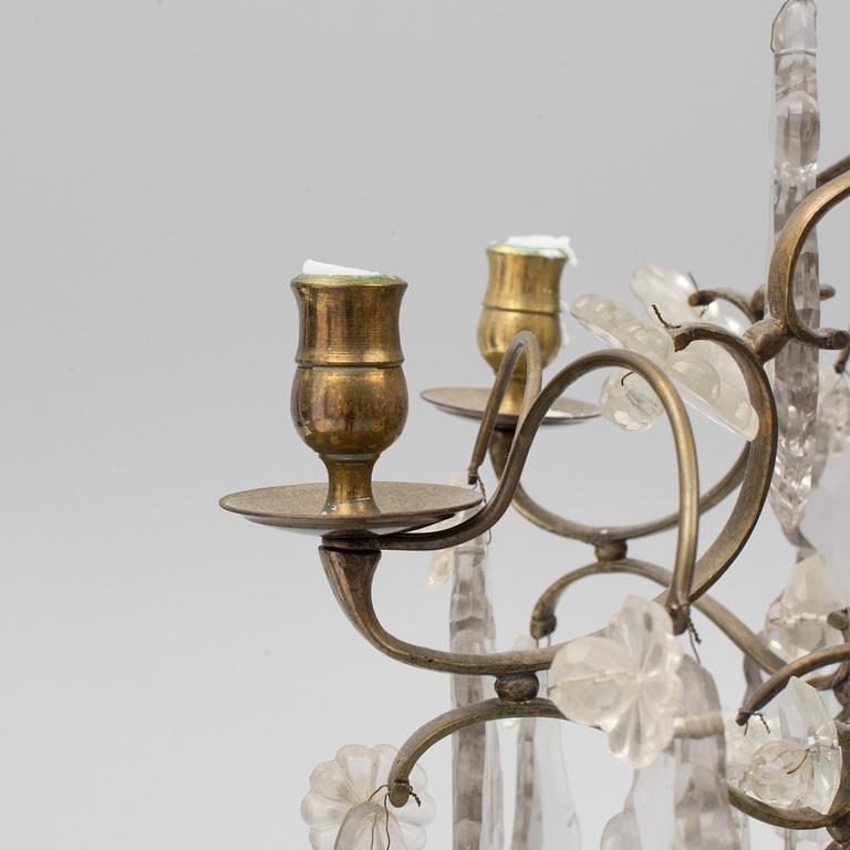 A Rococo style chandelier, early 20th century.