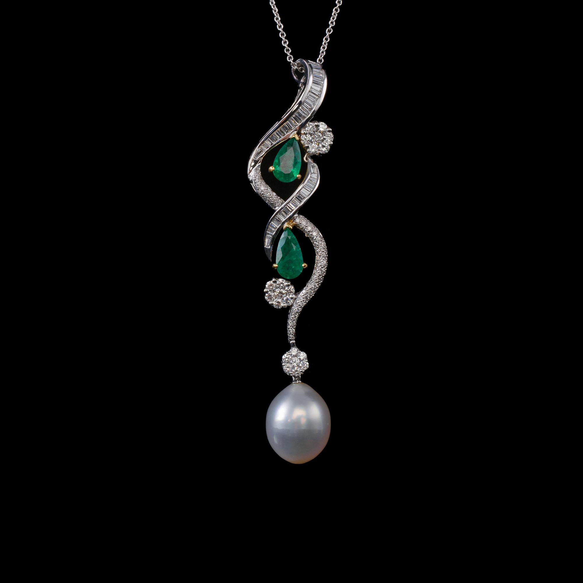 HÄNGE, Briljant- och baguetteslipade diamanter ca 2.98 ct. Kolumbianska smaragder ca 1.72 ct. Söderhavspärla  13 mm.