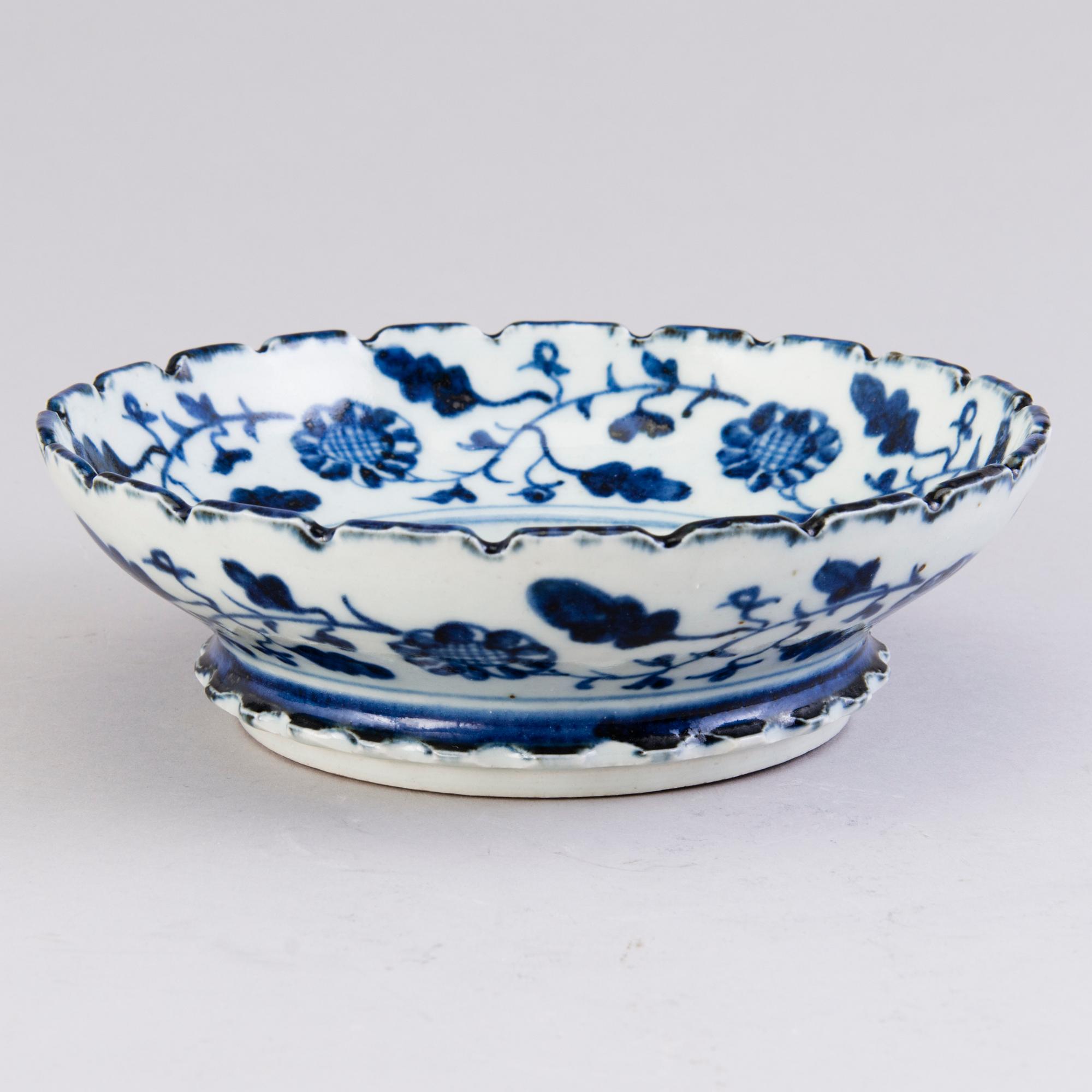 Four pieces of Chinese porcelain, two of which dated to the Ming dynasty (1364-1644).