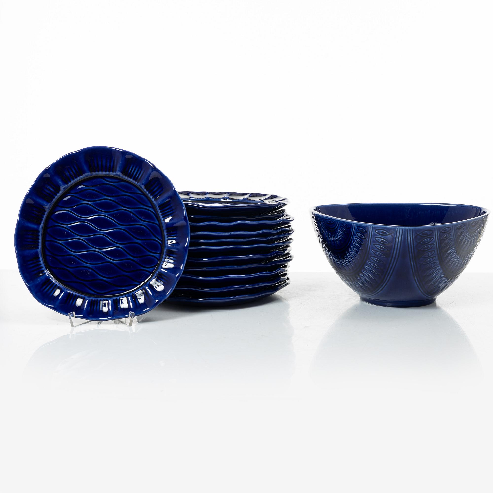 Hertha Bengtson, a stoneware bowl and twelve plates, Rörstrand, Sweden.