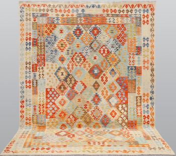 A kilim carpet, ca 350 x 258 cm.
