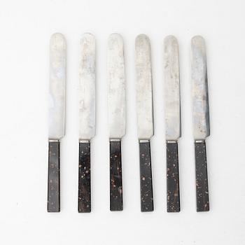 Six 19th century table knives with porphyry handles, Sweden.