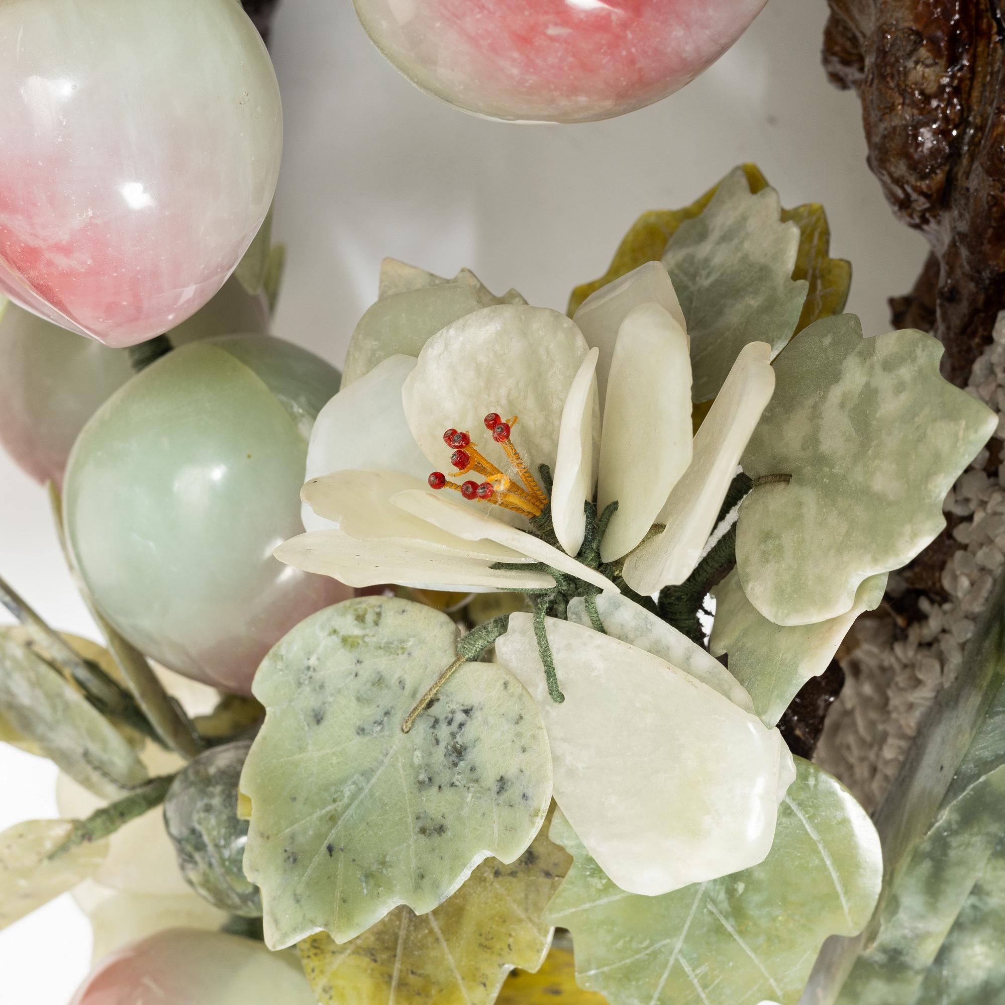 A stone table decoration in the shape of a peach tree, China, 20th century.