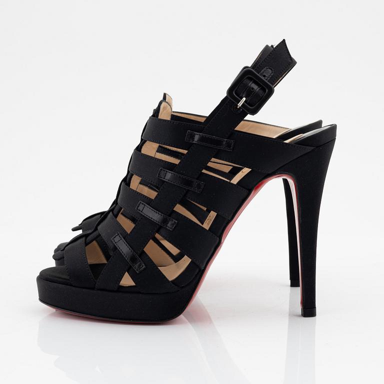 Christian Louboutin, a pair of black silk sandals, size 37 1/2.