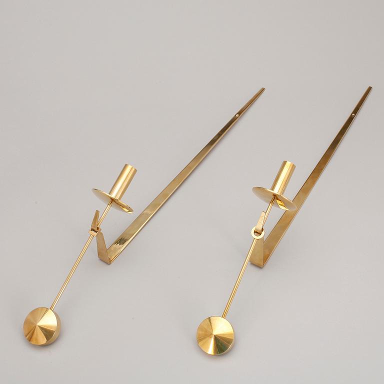 VÄGGLJUSSTAKAR, 2+2 stycken, mässing, "Reflex" samt "Pendeln", Pierre Forssell, Skultuna.