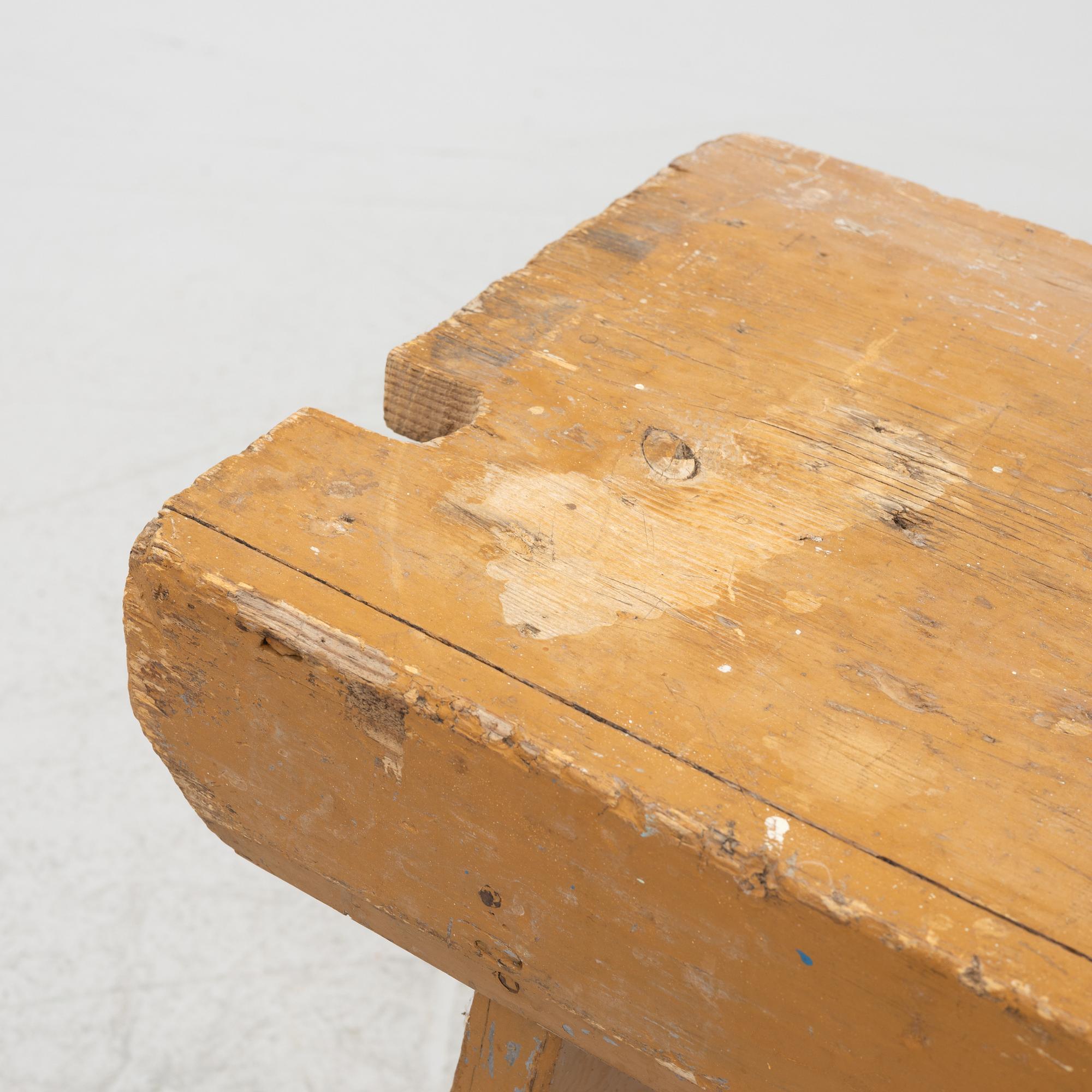 A painted bench, circa 1900.