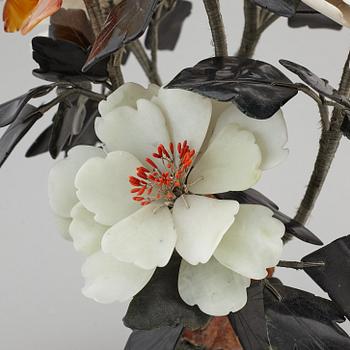 Two table decorations of different materials including agathe, nephrite quartz, stone, 20th century.