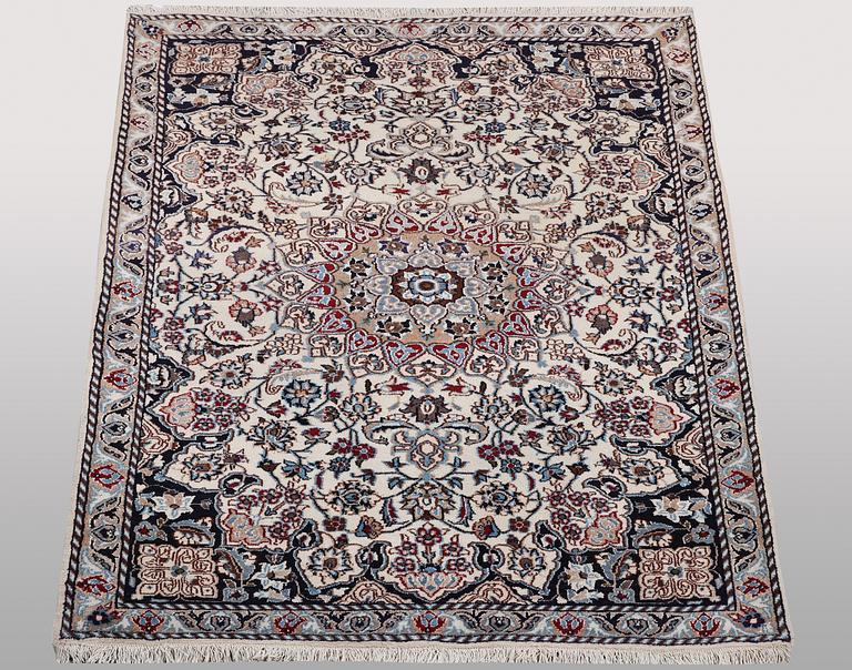 A rug, Nain, part silk, ca 196 x 120 cm.