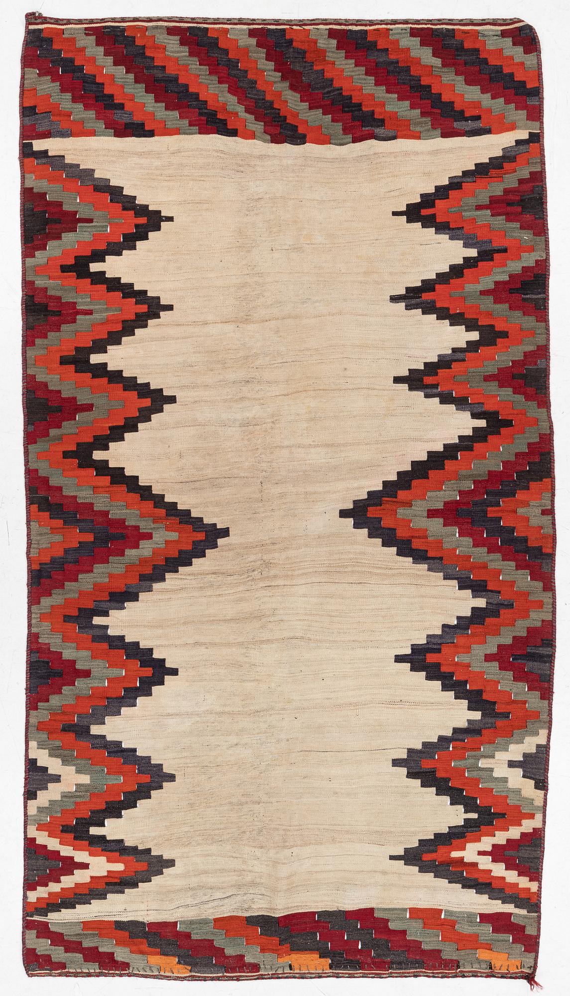A semi-antique Qashqai kilim, c. 350 x 188 cm.