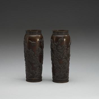 A pair of Japanese bronze vases, Meiji (1868-1912).