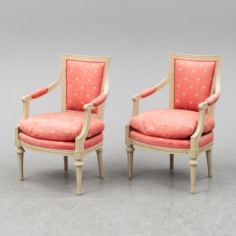 A pair of gustavian style armchairs, second half of the 20th century.