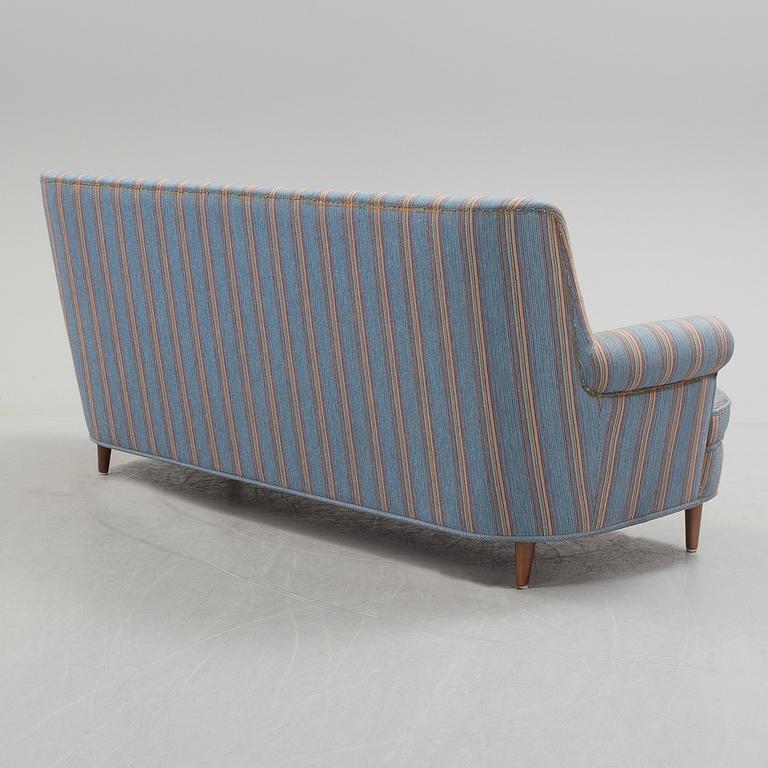 A Carl Malmsten"Hemmakväll" sofa from late 20th century.