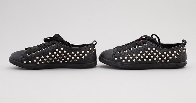 PRADA, two pairs of leather sneakers, size 35,5.