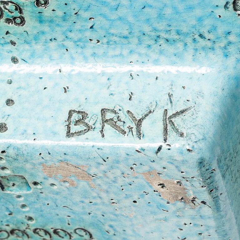 Rut Bryk, plates, as well as plate/wall relief, stoneware.