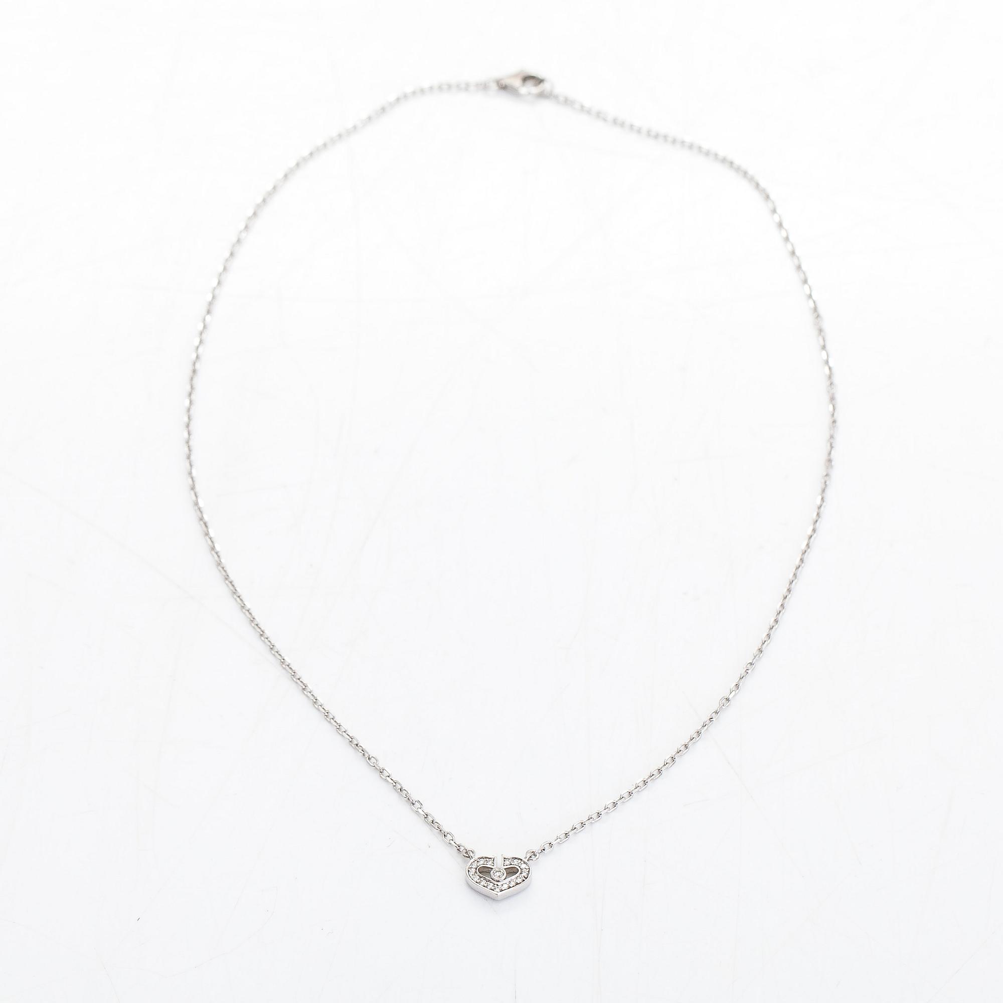 Cartier, an 18K white gold 'C Heart of Cartier' necklace with diamonds approx. 0.09 ct in total.