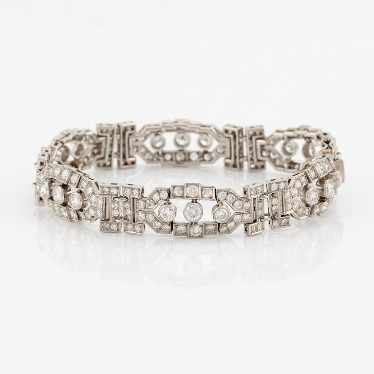 A platinum bracelet with round brilliant-and eight-cut diamonds.