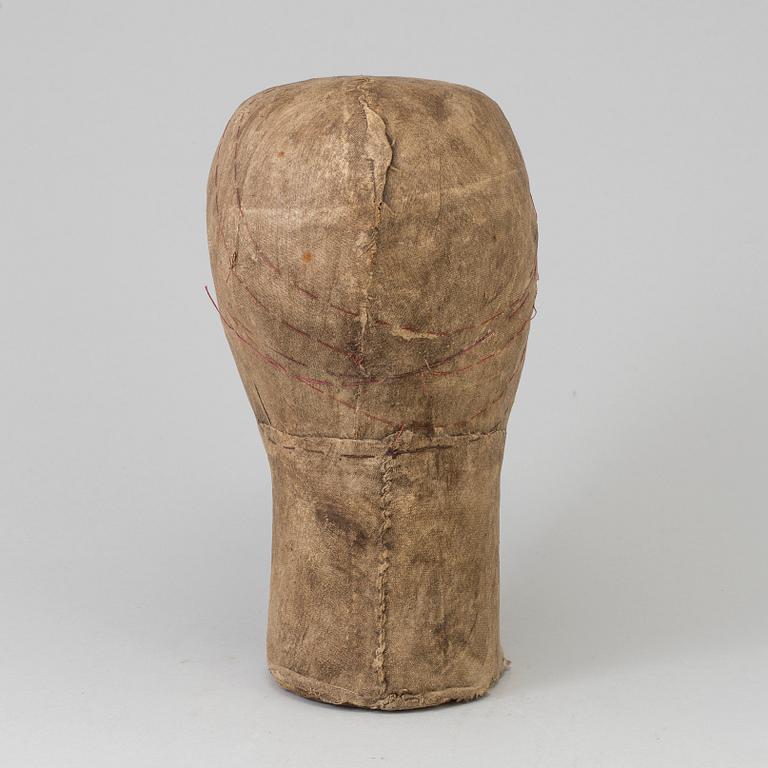 A 19TH CENTURY WIG STAND, covered in linen.