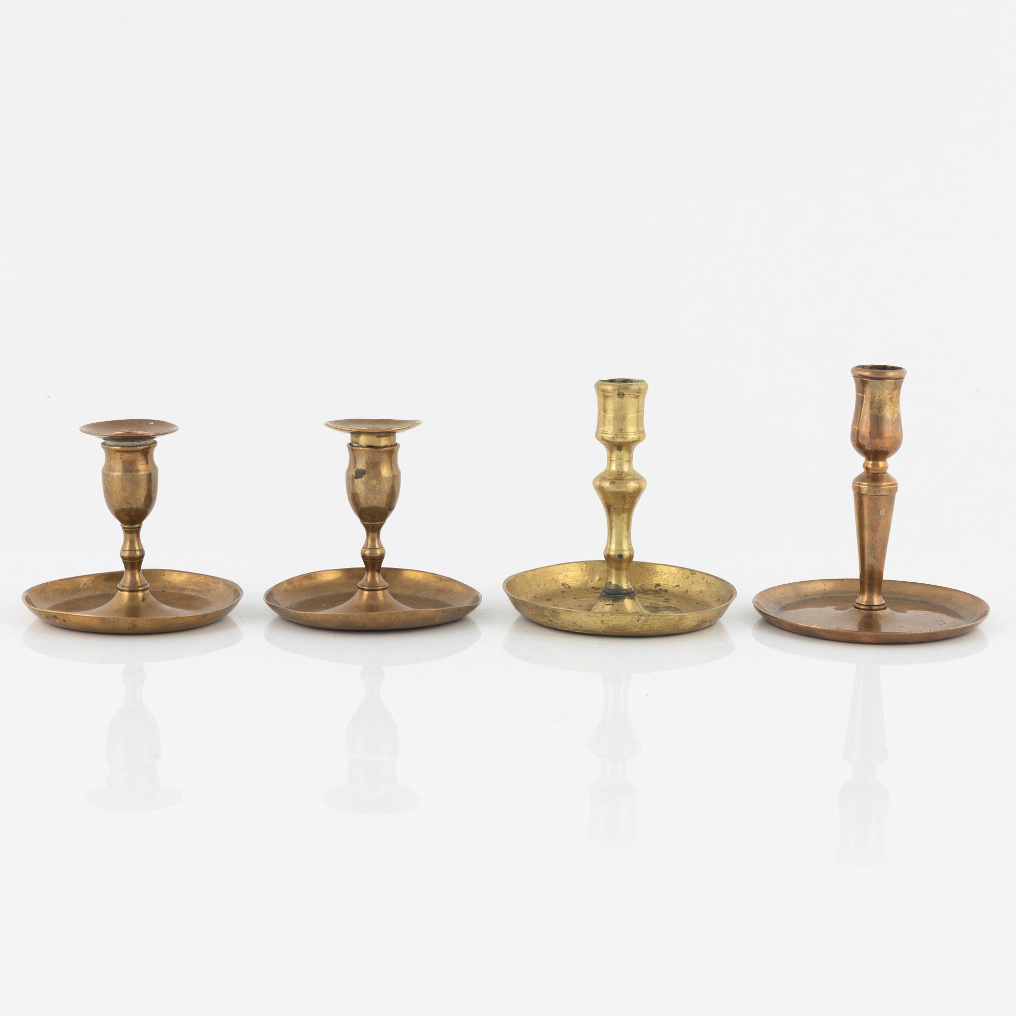 Four bronze candlesticks, a pair of which Skultuna model N 60, 18th-19th Century.