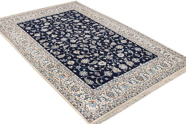 A part silk Nain rug, 9LA, c. 302 x 198 cm.