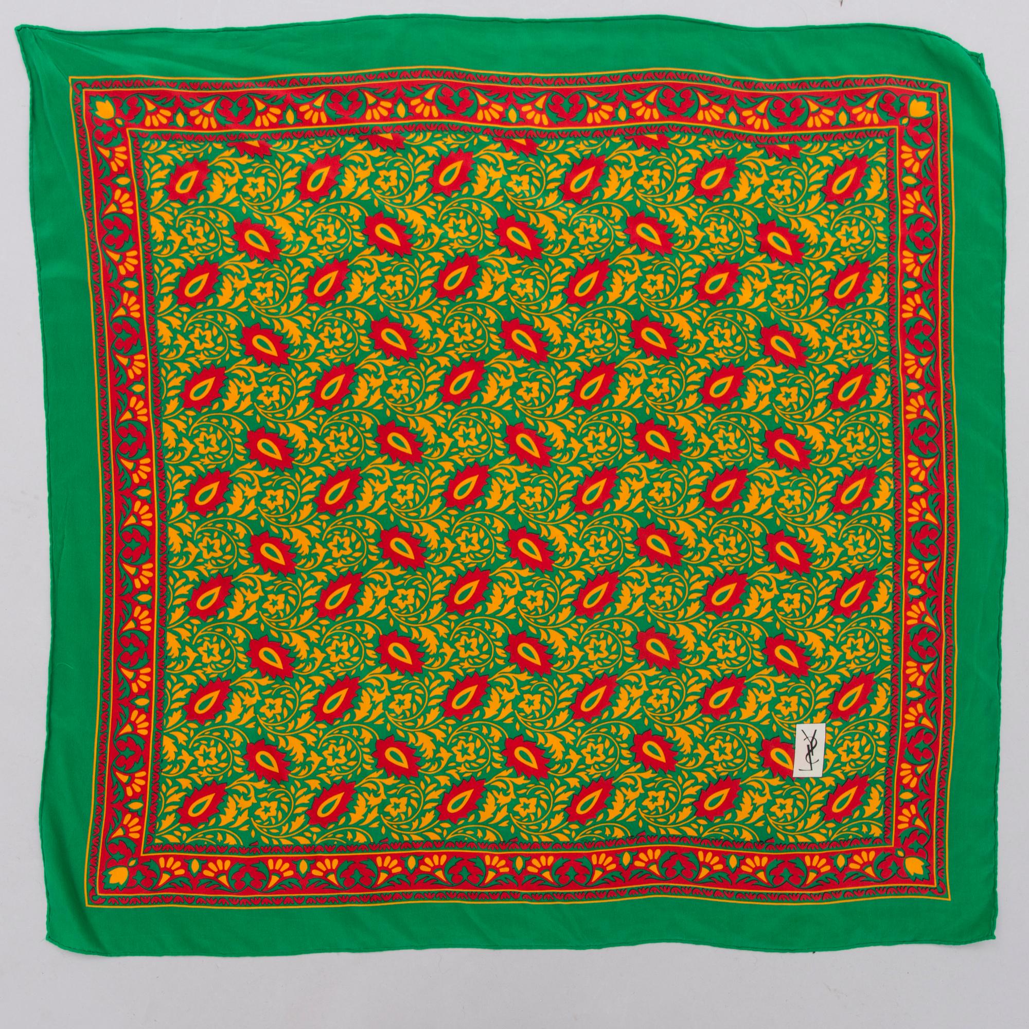 Two Silk Scarves by YSL and must de Cartier.