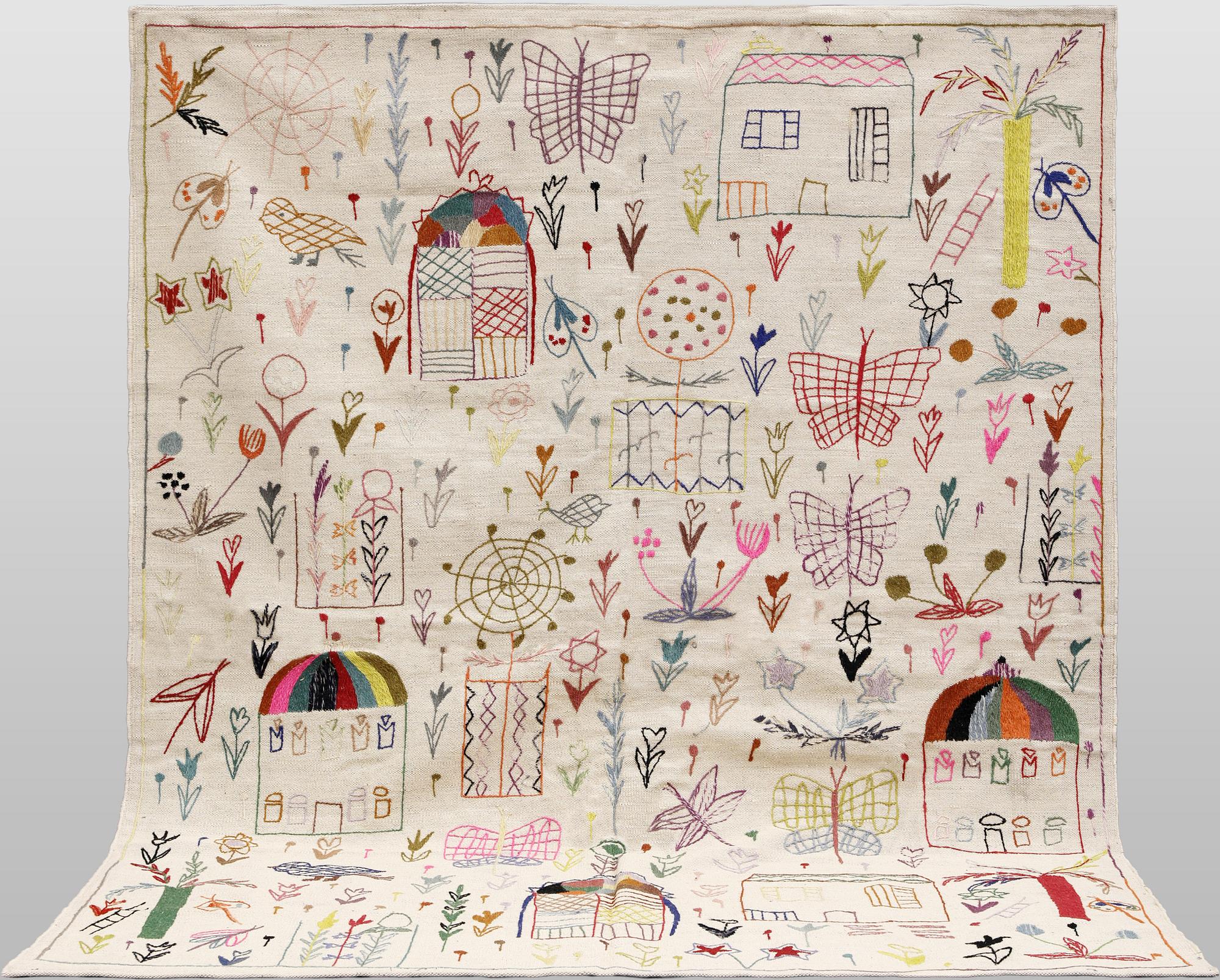 A Kelim rug, hand-embroidered, 241 x 179 cm.