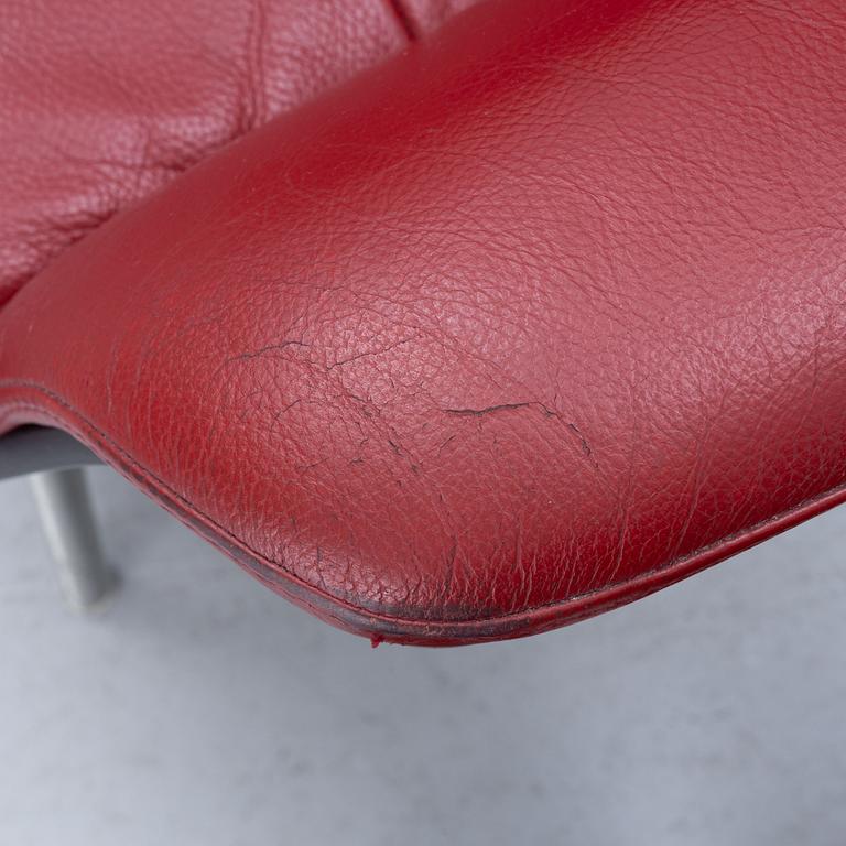 A pair of armchairs with footstool, "Timeout" by Conform, late 20th century.