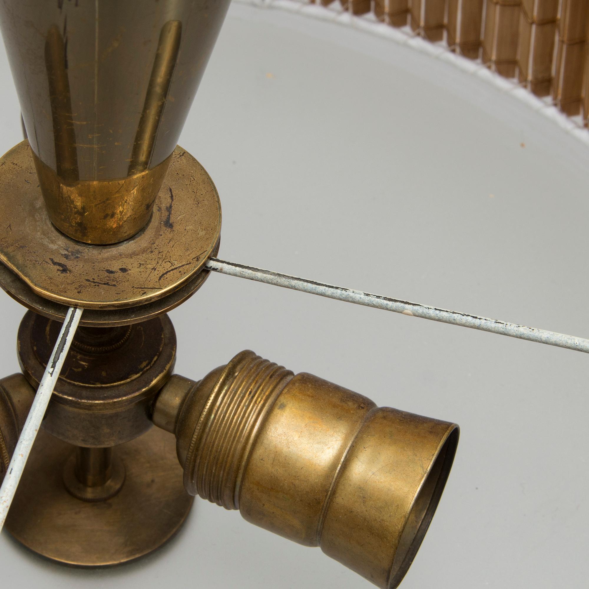 Taklampa, Idman 1900-talets mitt.