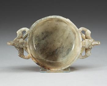 A carved nephrite ceremonial wine cup, late Qing dynasty.
