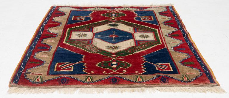 An antique Anatol rug, c. 170 x 134 cm.