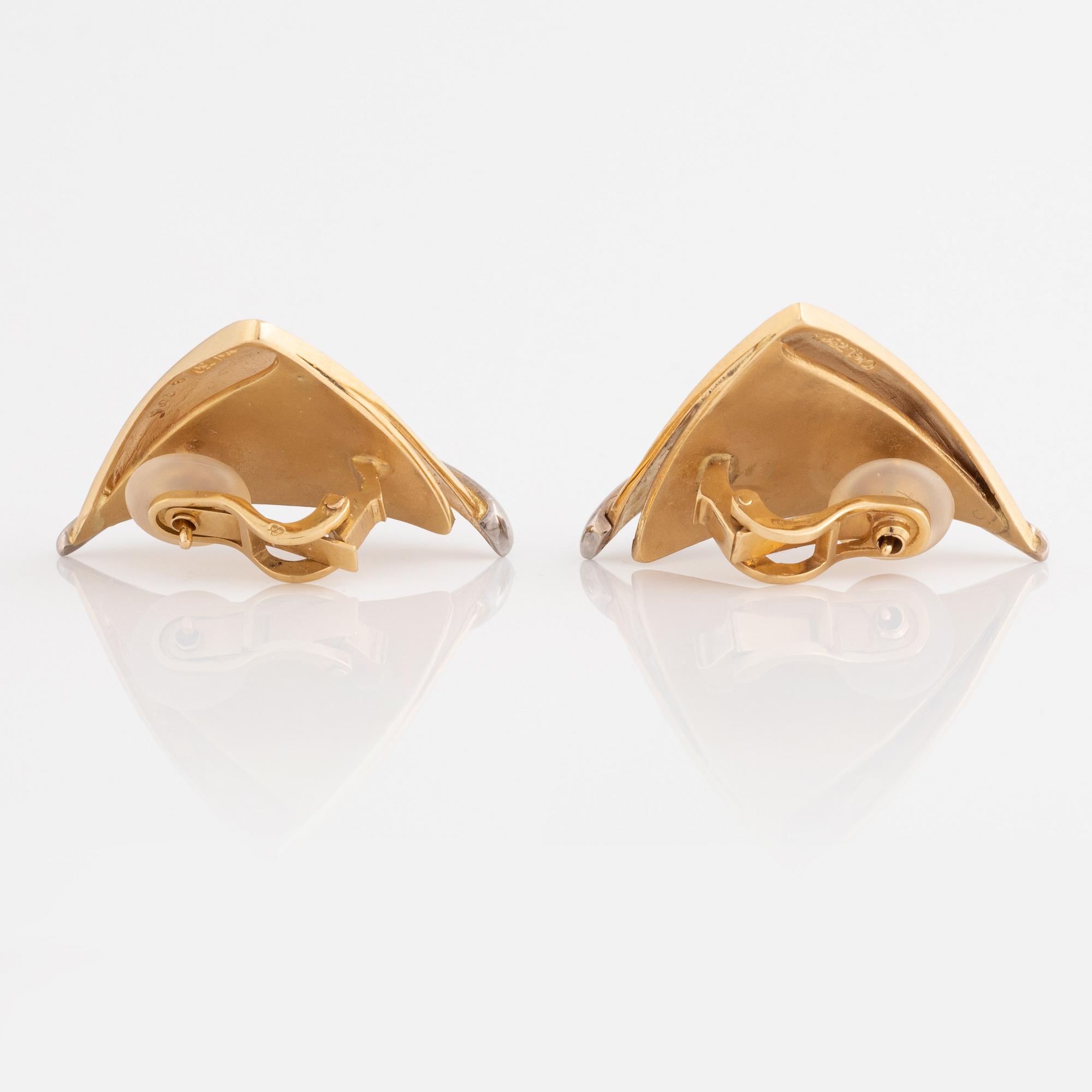 A pair of 18K gold Ole Lynggard earrings set with round brilliant-cut diamonds.