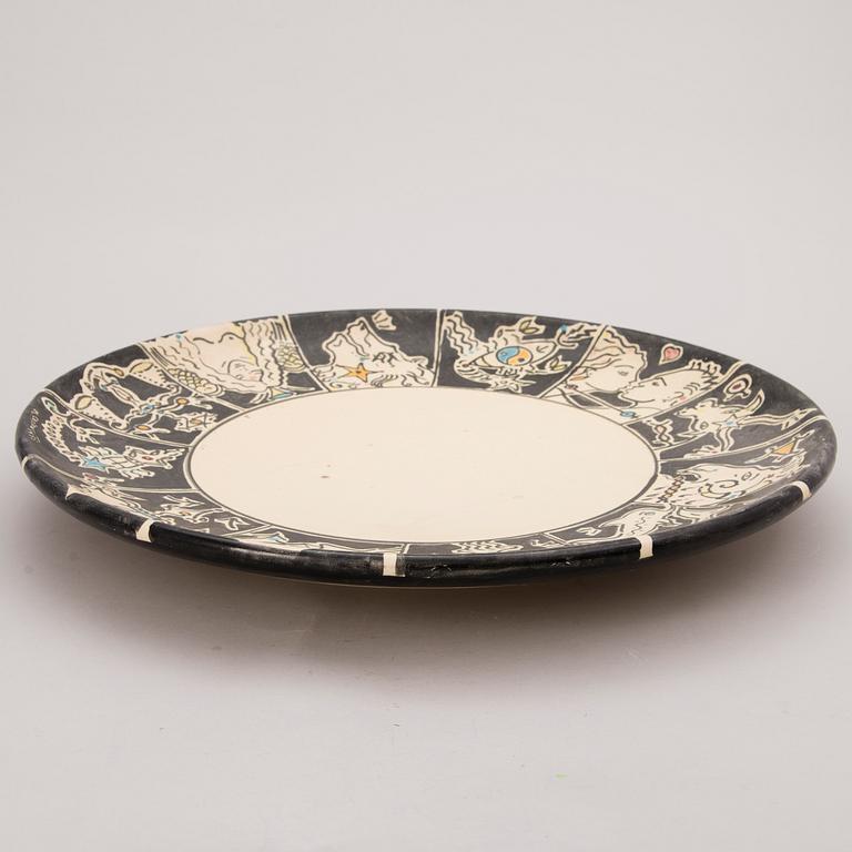 A ceramic bowl, signed and dated 1995.