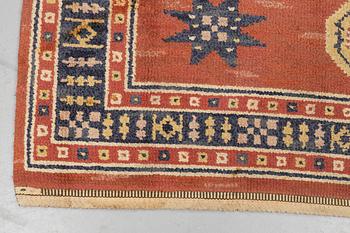 Märta Måås-Fjetterström, a carpet, "Röd Flossa", knotted pile, ca 300 x 272 cm, signed AB MMF.