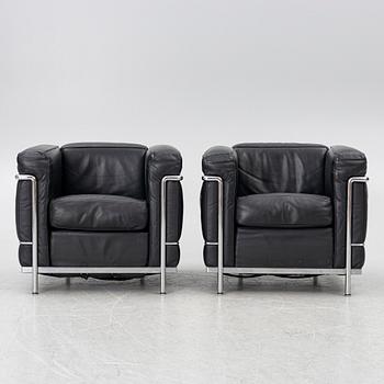 Le Corbusier (Charles-Édouard Jeanneret), Pierre Jeanneret, Charlotte Perriand & Le Corbusier, a pair of 'LC2' armchairs, Cassina.