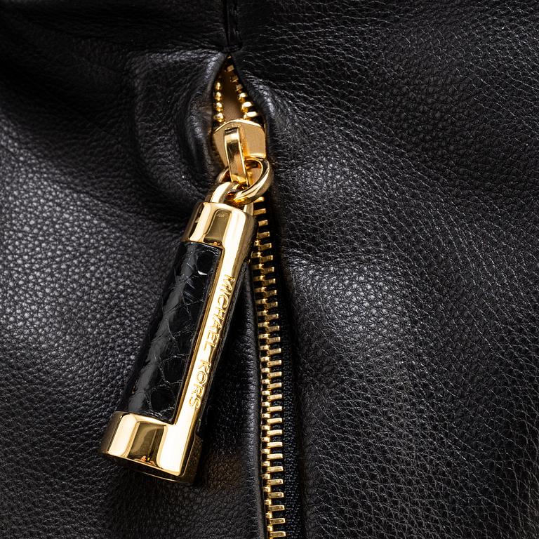 MICHAEL KORS, a black leather handbag.