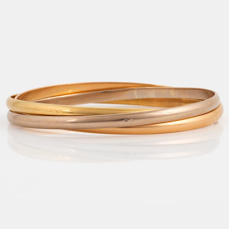 A Cartier "Trinity" bangle.