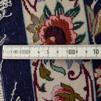 A CARPET, Esfahan, Signed Esfahan Miko Karzaadeh, around 239 x 157 cm.