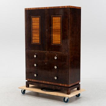 David Blomberg, a birch and rosewood veneered cabinet, 1930's.