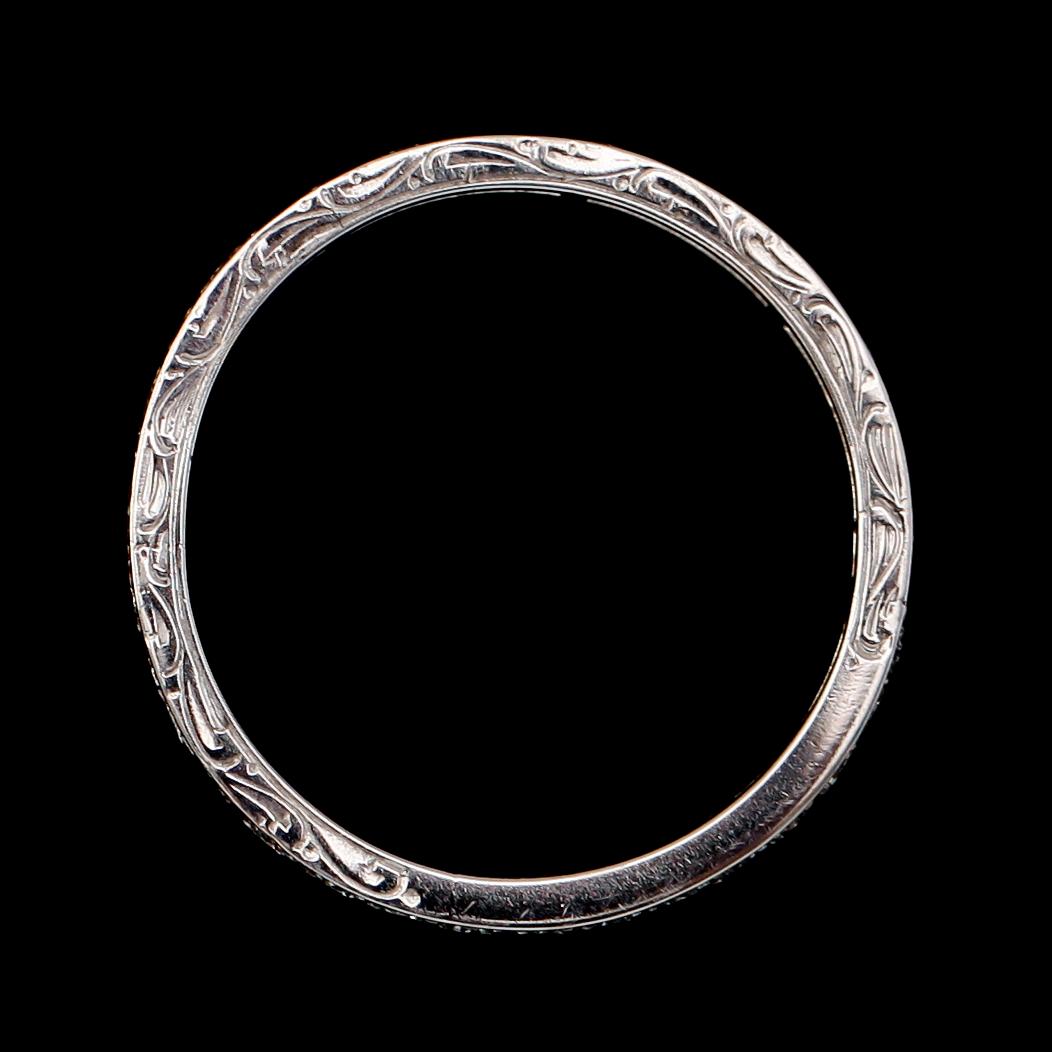 ALLIANSRING, 18 k vitguld, briljantslipade diamanter tot ca 0.66 ct.