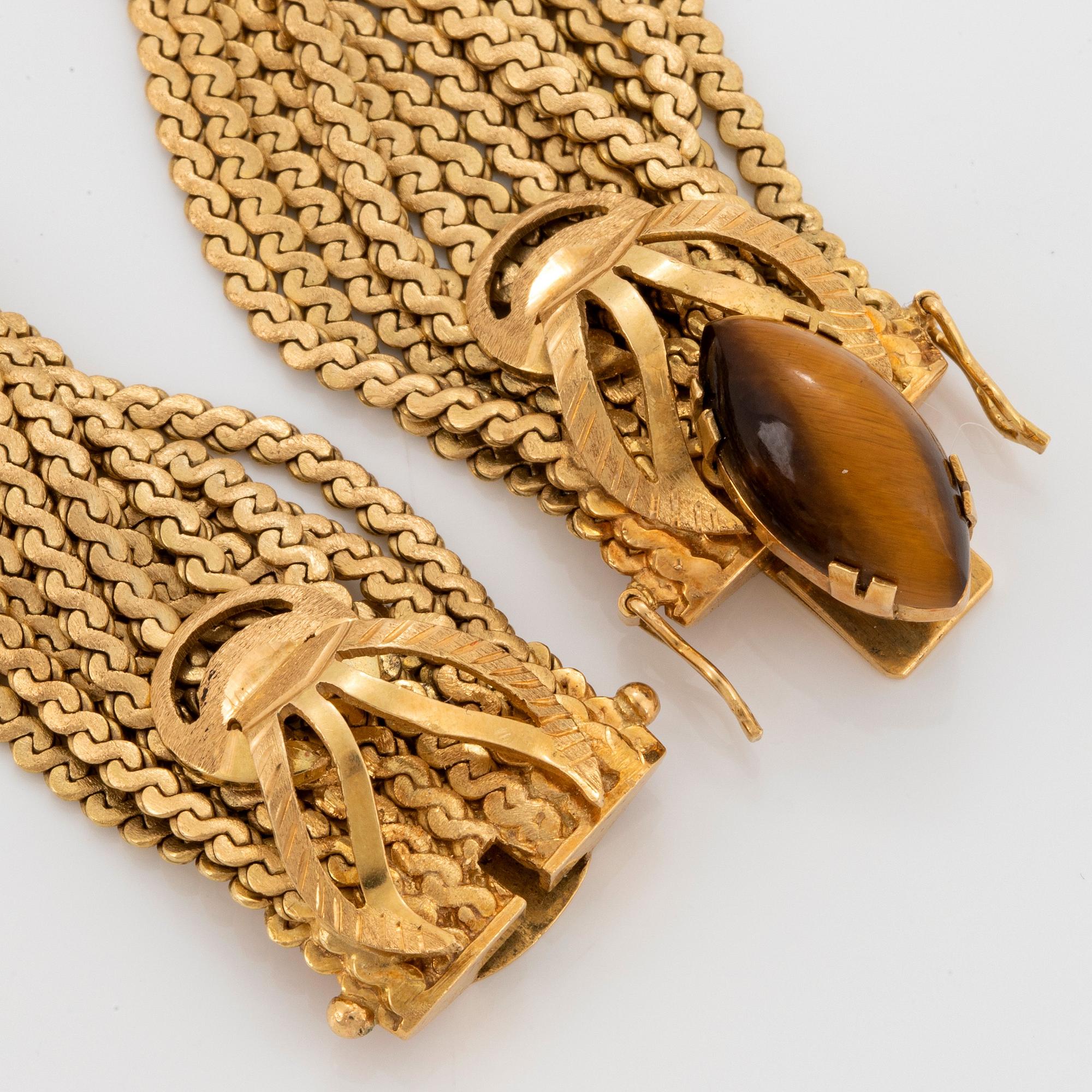 Armband 18K guld med kvarts-kattöga.