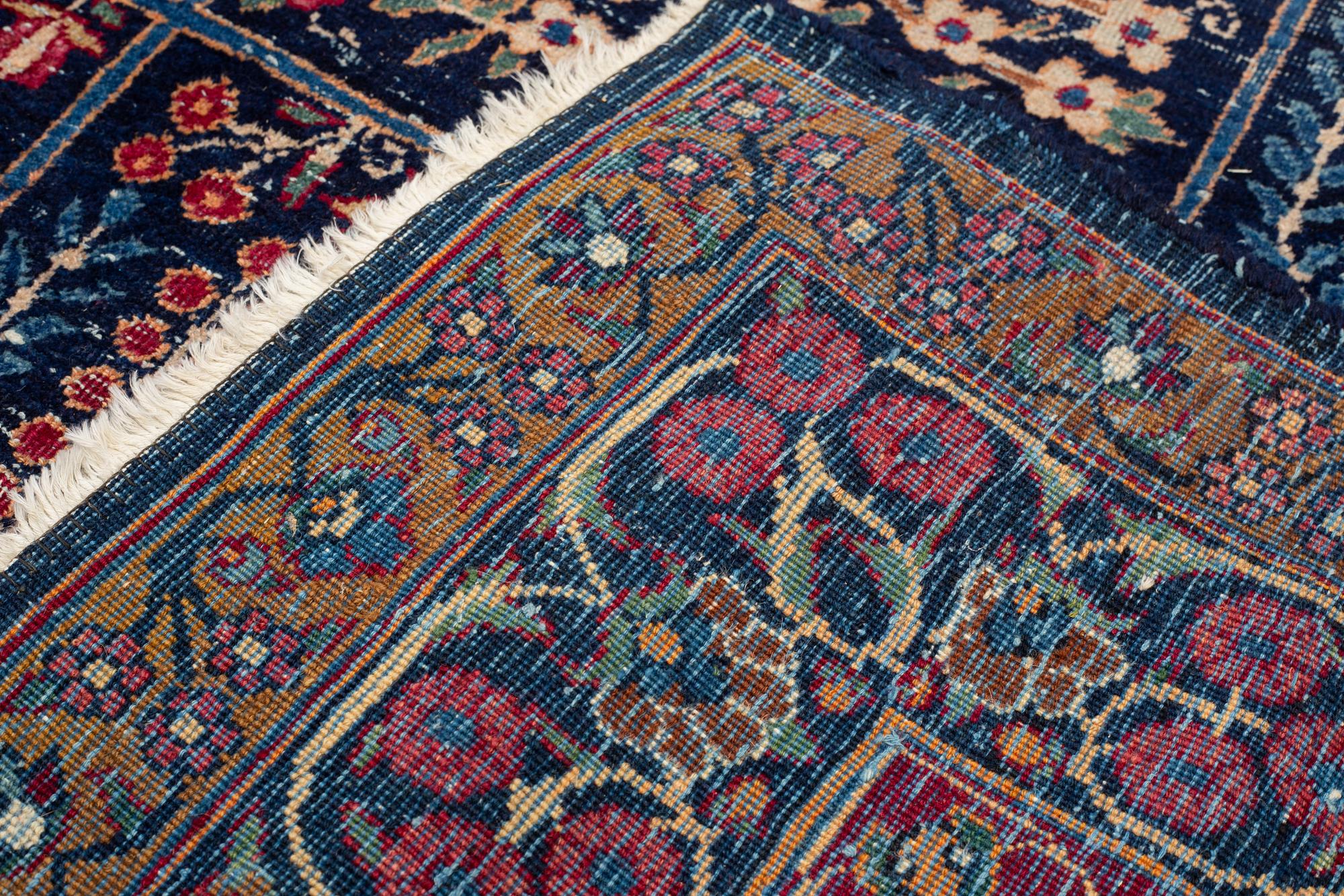 A carpet, an antique/a semi-antique Yezd, ca 557-562 x 366,5-370,5 cm.
