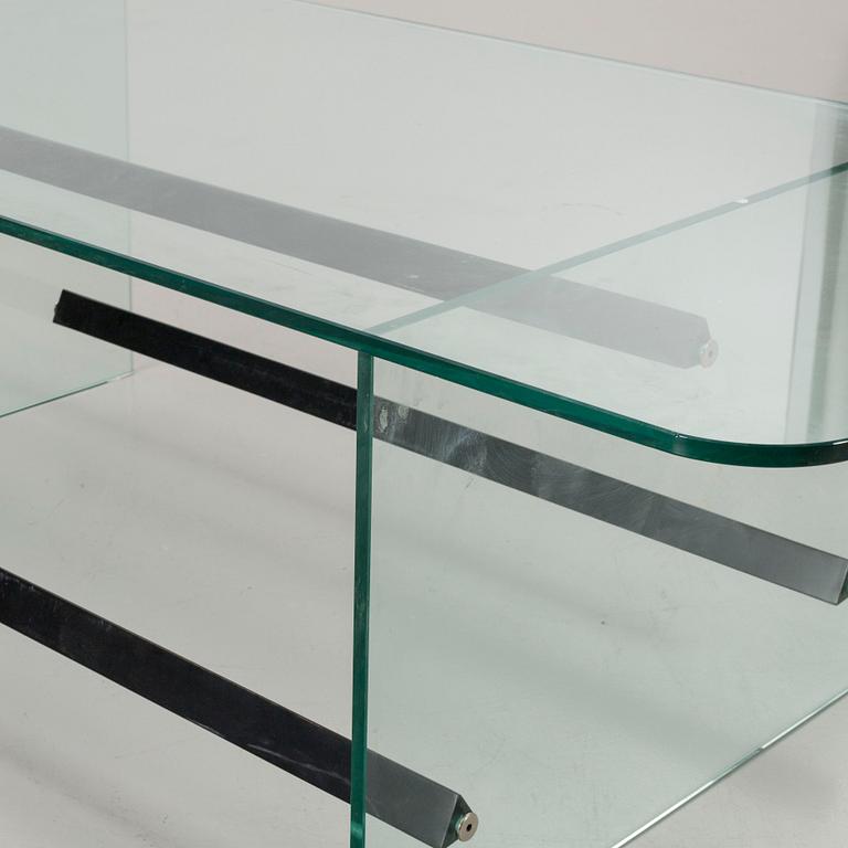 A late 20th century glass table.