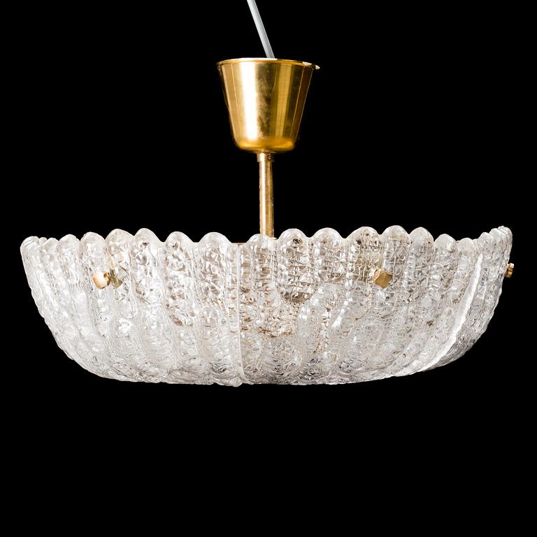 CARL FAGERLUND, a brass and glass ceiling lamp, Orrefors.