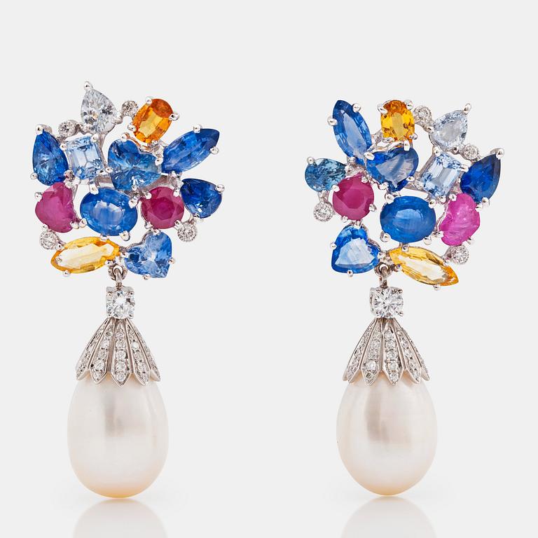 A pair of cultured pearl, sapphire, ruby and diamond earrings.