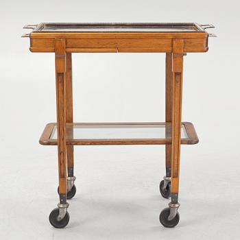A restaurant serving trolley with silver plate dishes, first half of the/mid 20th century.